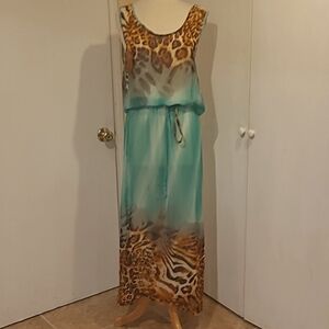See-through aqua dress with tiger print.